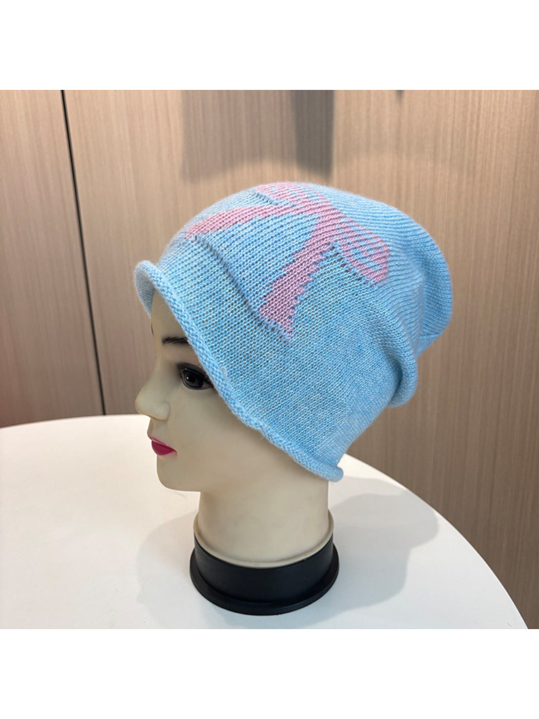 Haila - Bow and Cross Motif Rolled Edge Knit Beanie