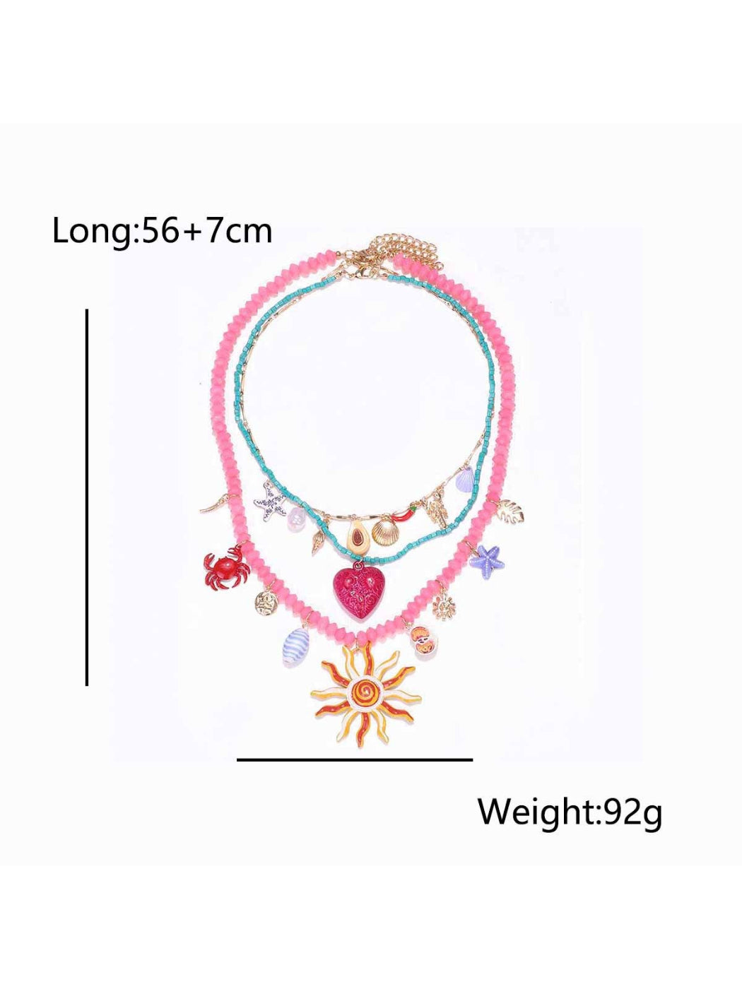 Neckit layered charm necklace with sun and heart detail styled with casual outfit