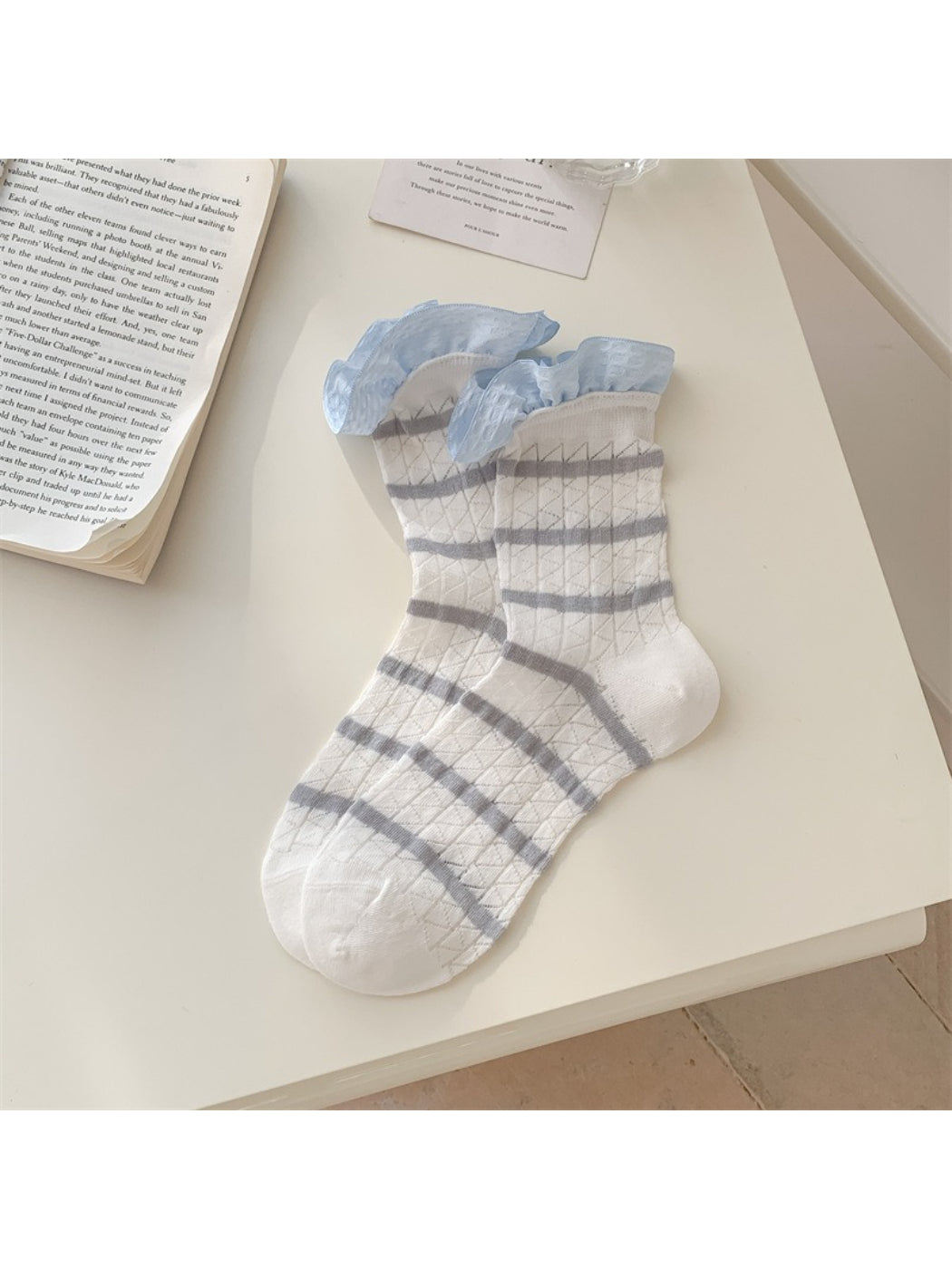 Rufia summer crew socks styled with rolled-up jeans to showcase stripe and frill cuff