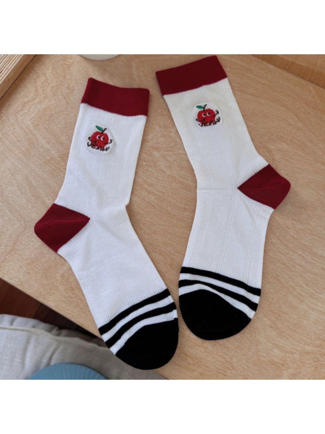 Rufia playful fruit detail socks packaged with branding label attached