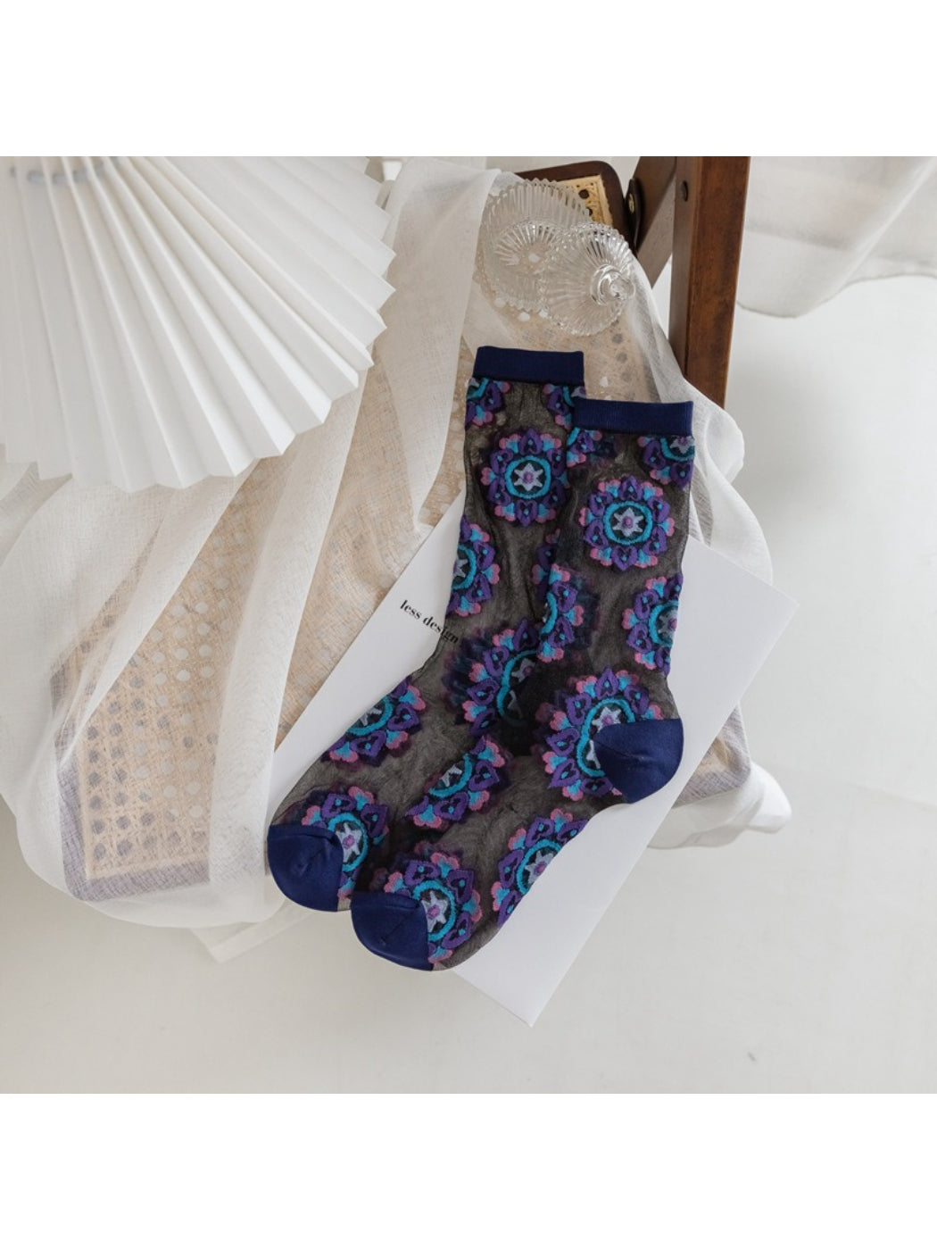 Rufia sheer blossom pattern crew socks paired with casual shoes in lifestyle setting