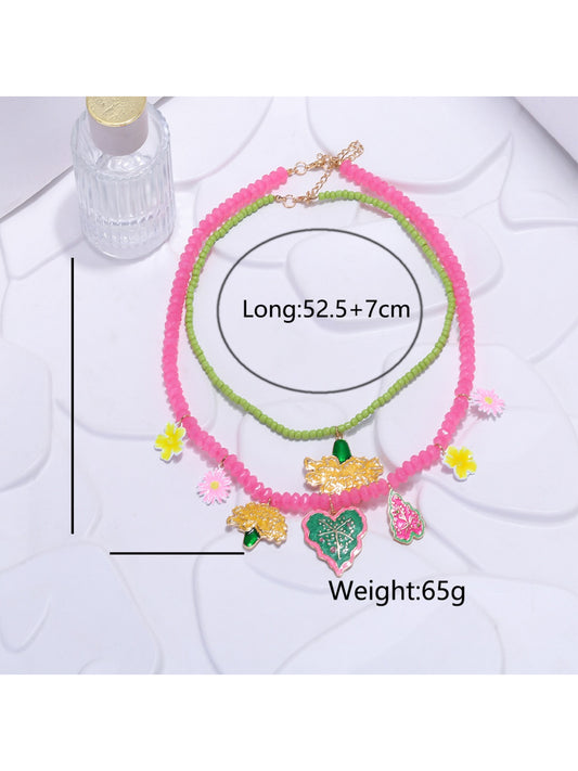 Neckit Summer Fruit Necklace displayed on a white background showing fruit and floral charms