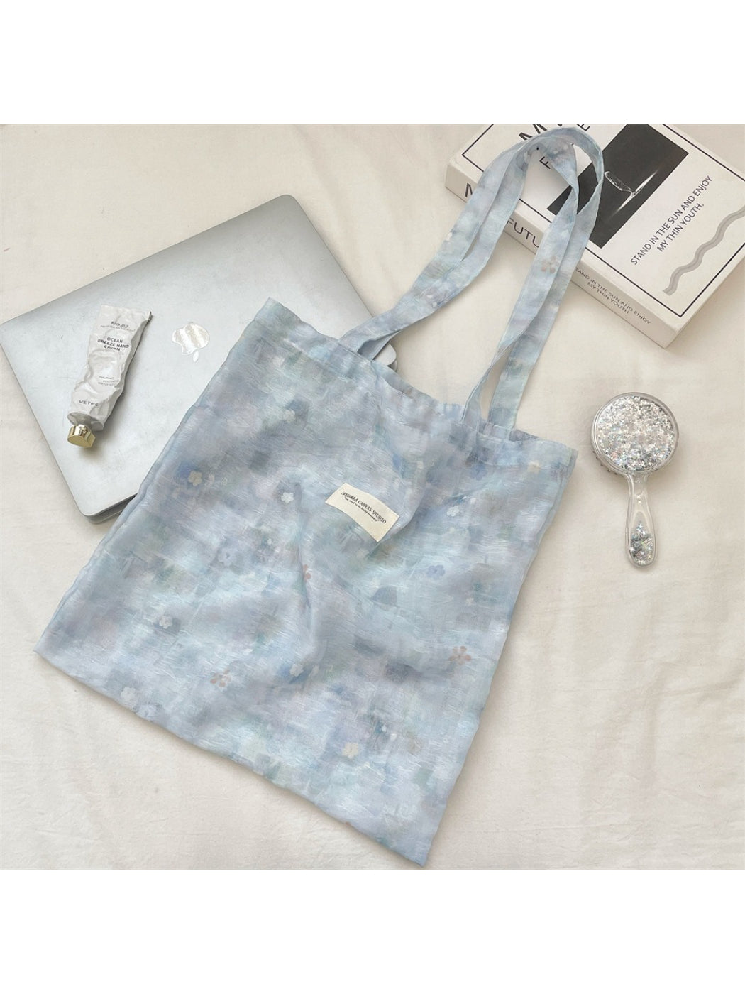 Cosbai pastel flower everyday tote bag with handles visible and floral print