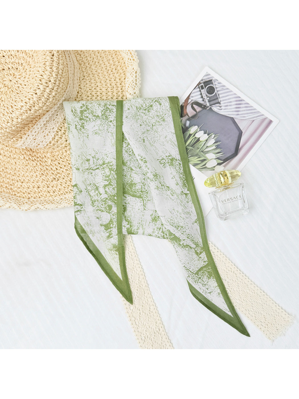 Scarvii abstract print triangle scarf folded with visible fabric texture