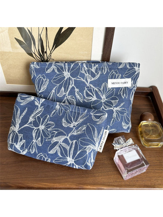Close-up of detail on Cosbai floral cosmetic bag