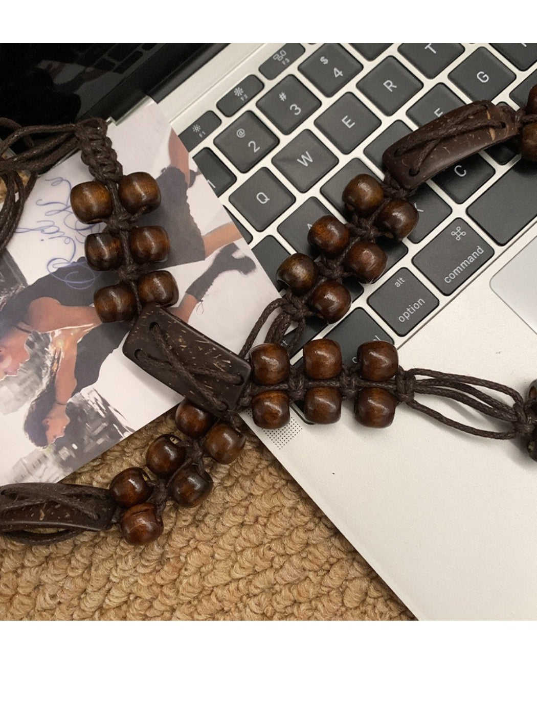 Detailed shot of Beco brown beaded tie waist belt beads and fabric ends