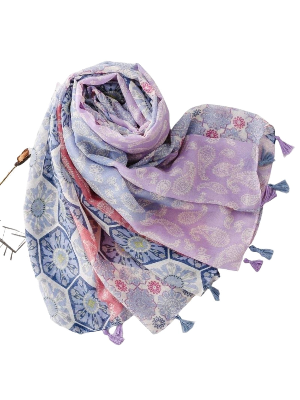 Pastel patchwork tassel scarf folded neatly on a flat surface