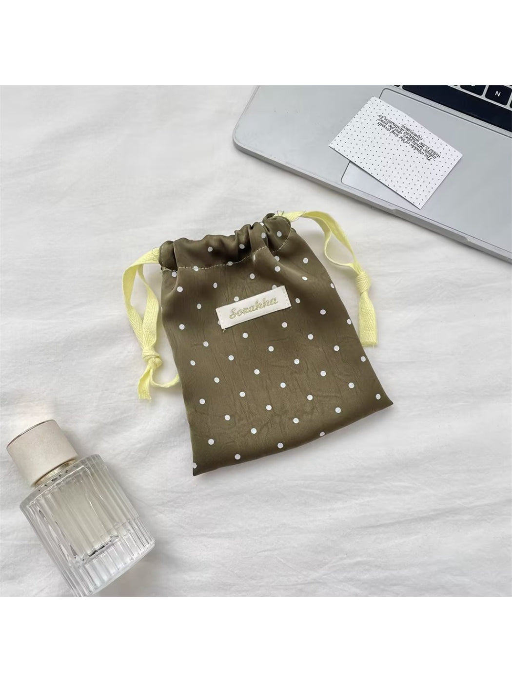 Cosbai Sweet Dot Drawstring Bag with matching accessories on display