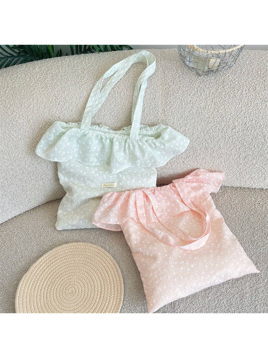 Side view of Cosbai Tiny Floral Ruffle Tote Bag showing floral pattern and ruffle trim