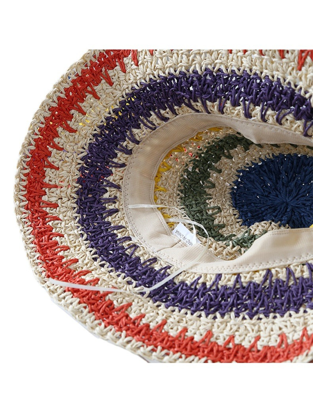 Haila colorblock crochet style bucket hat shown from a top angle on a plain background