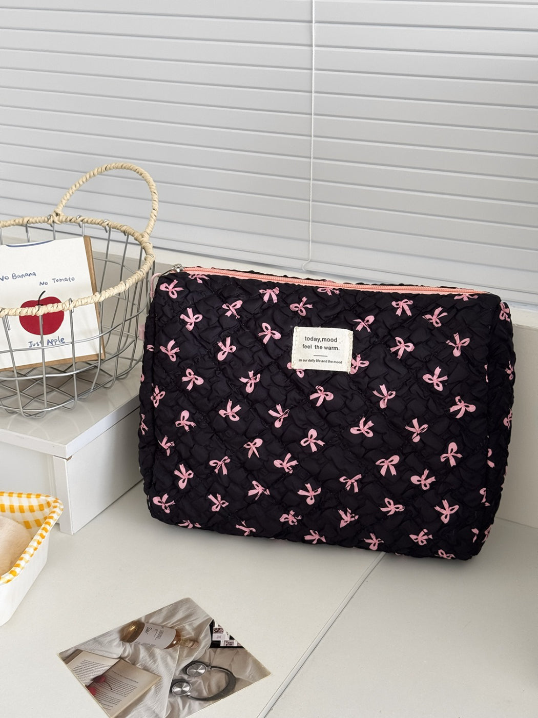 Cosbai Sweet Ribbon toiletry bag standing upright on white background
