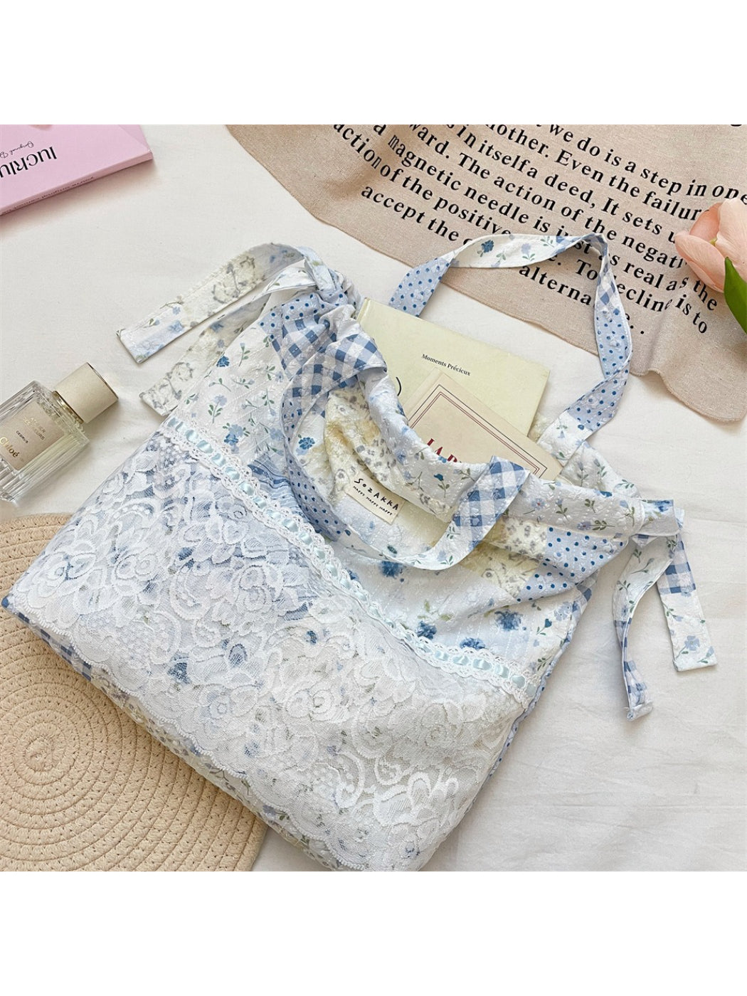 Cosbai Romantic Lace Patchwork Shoulder Tote displayed hanging on a hook