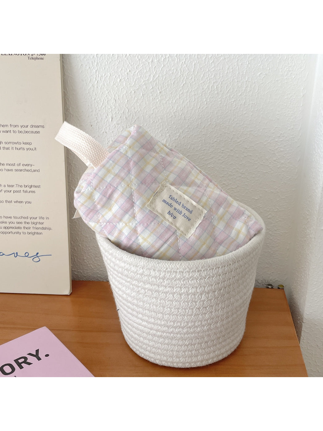 Cosbai travel makeup bag with pastel check pattern displayed from side angle