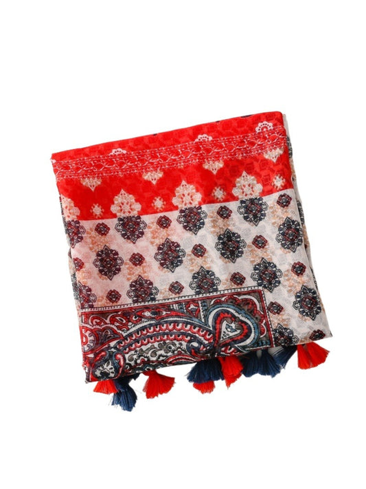 Close-up of red scarf fabric highlighting detailed boho border design and texture