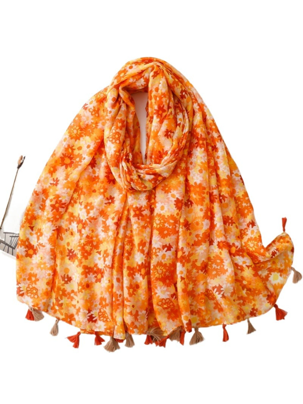 Bright ditsy floral wrap scarf displayed flat highlighting fabric texture