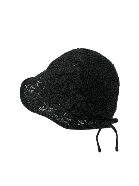 Side view of Haila open knit tie back hat in beige