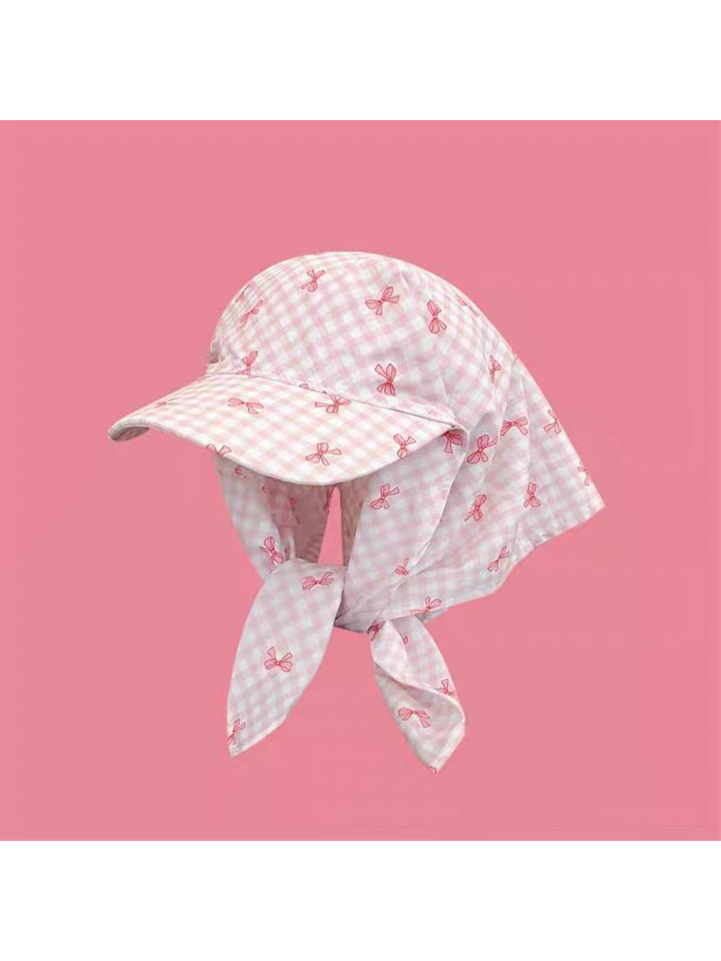 Haila plaid turban hat worn on a mannequin head showing overall fit and style