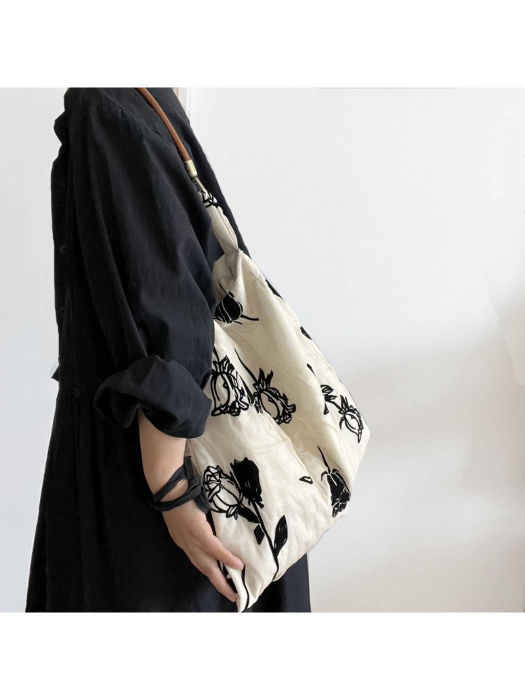 Back view of Cosbai Abstract Floral Slouch Shoulder Bag highlighting strap detail