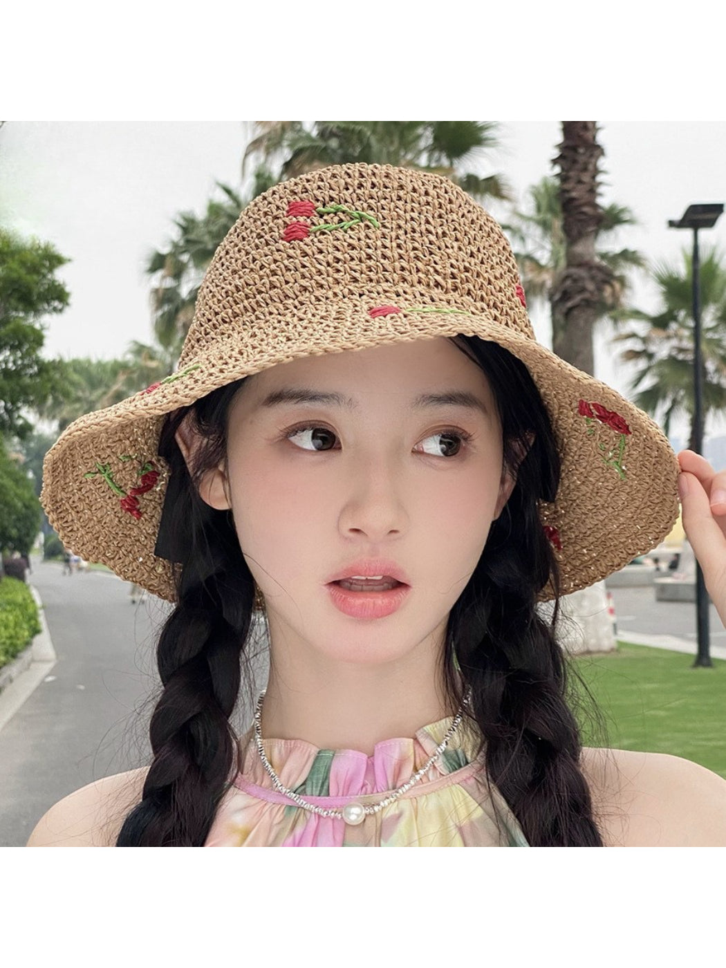 Haila Cherry Stitch Woven Sun Hat displayed on a mannequin with natural lighting