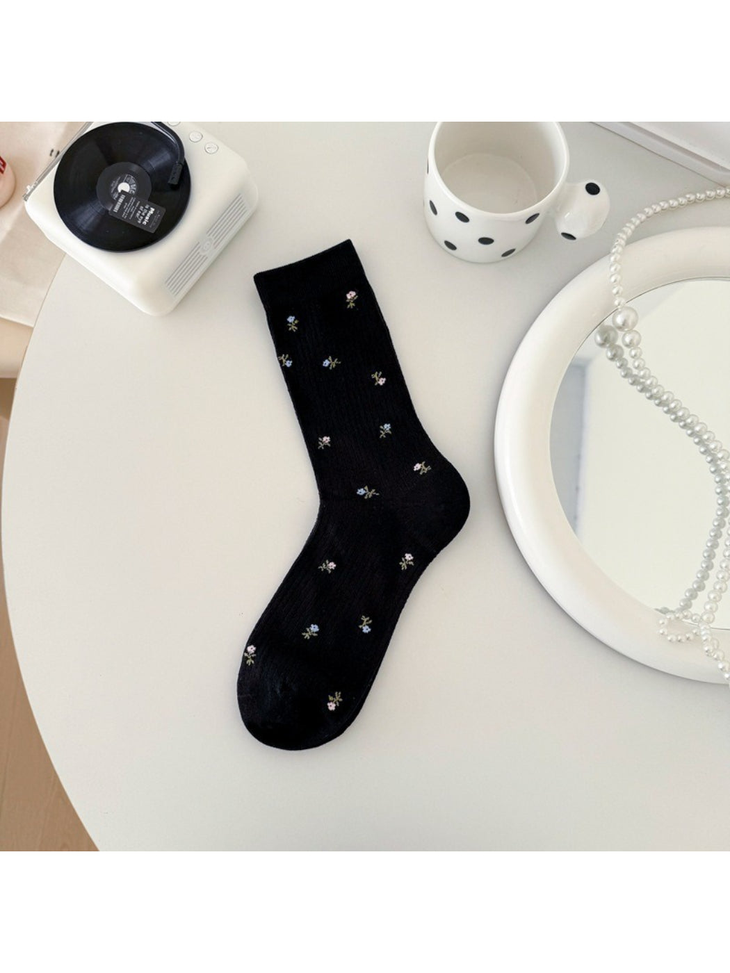 Rufia soft blossom pattern crew socks packaged with branded label
