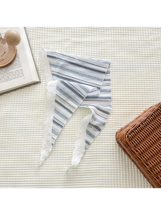 Close-up of Scarvii scarf showing delicate lace trim and stripe details