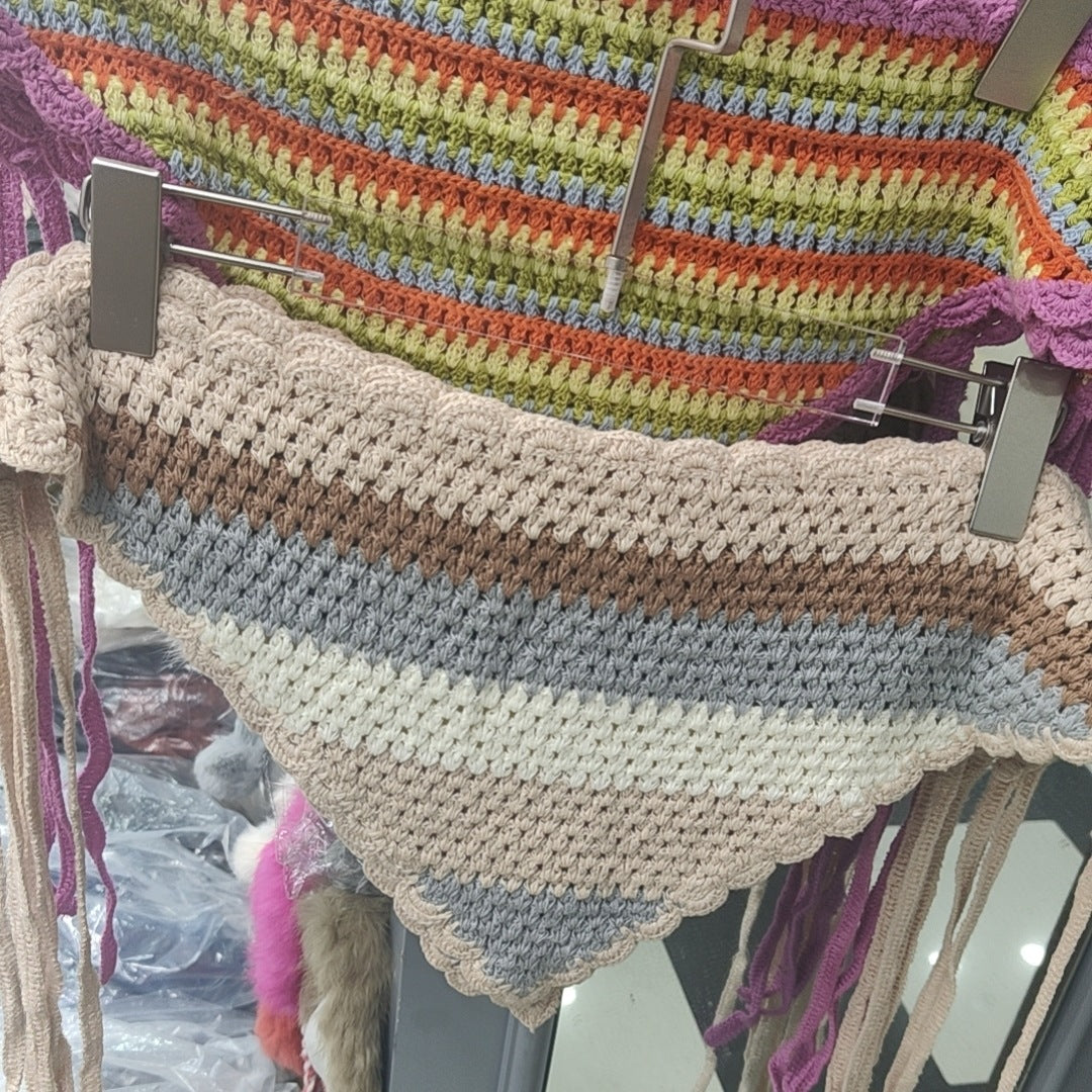 Scarvii crochet striped hairband with alternating light and dark stripes shown from side angle