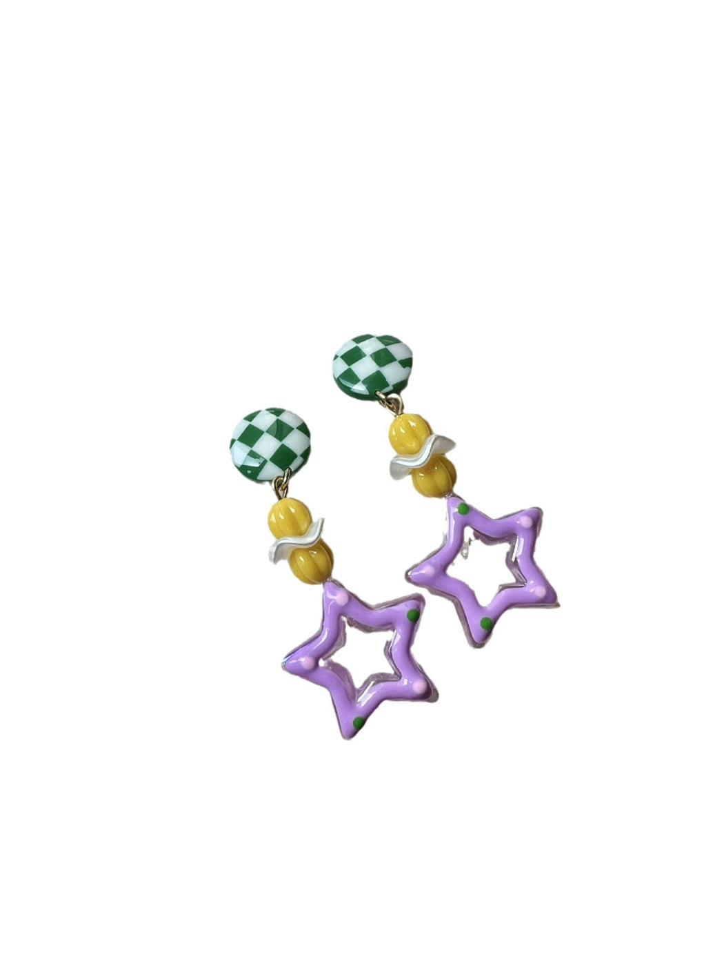 Model wearing silver star charm earrings showcasing their size and sparkle