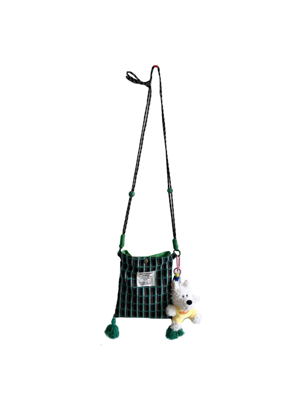 Cosbai plaid phone bag worn crossbody with dog charm visible