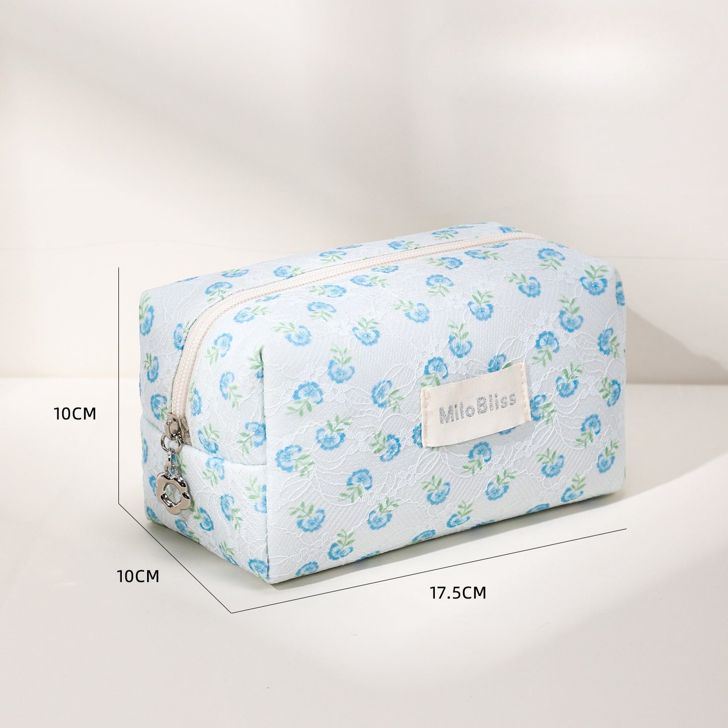 Cosbai small floral makeup organizer shown closed with a clear view of the floral design