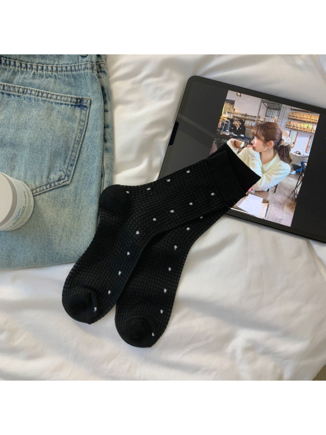 Pair of Rufia beige waffle dot crew socks arranged side by side on flat surface