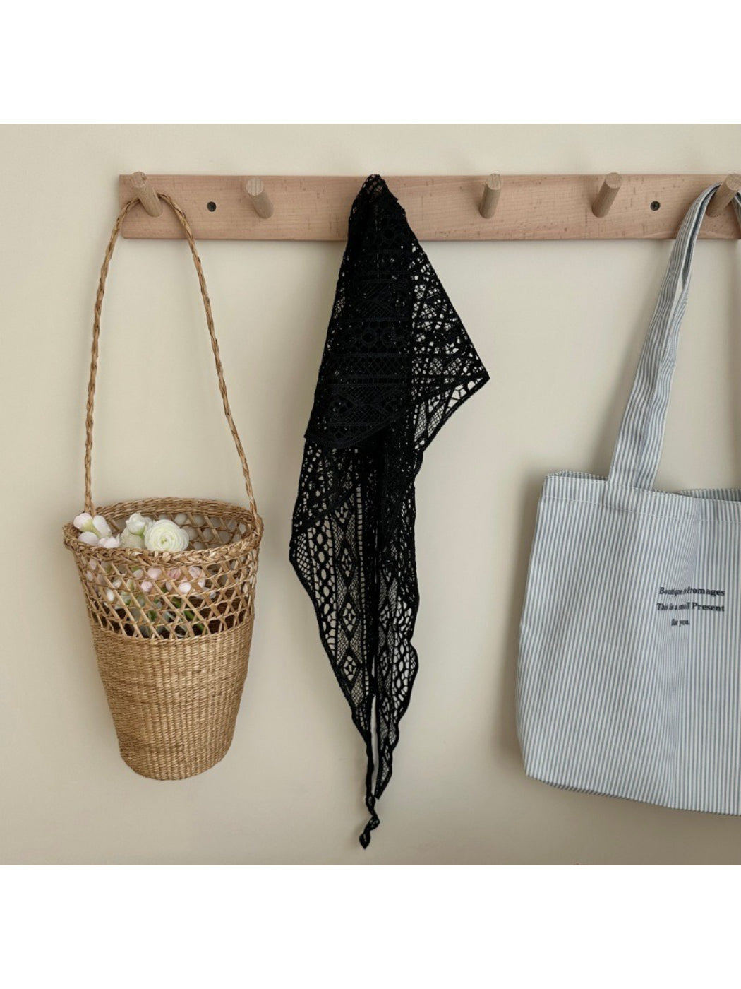 Boho crochet triangle headscarf folded to show texture and pattern details