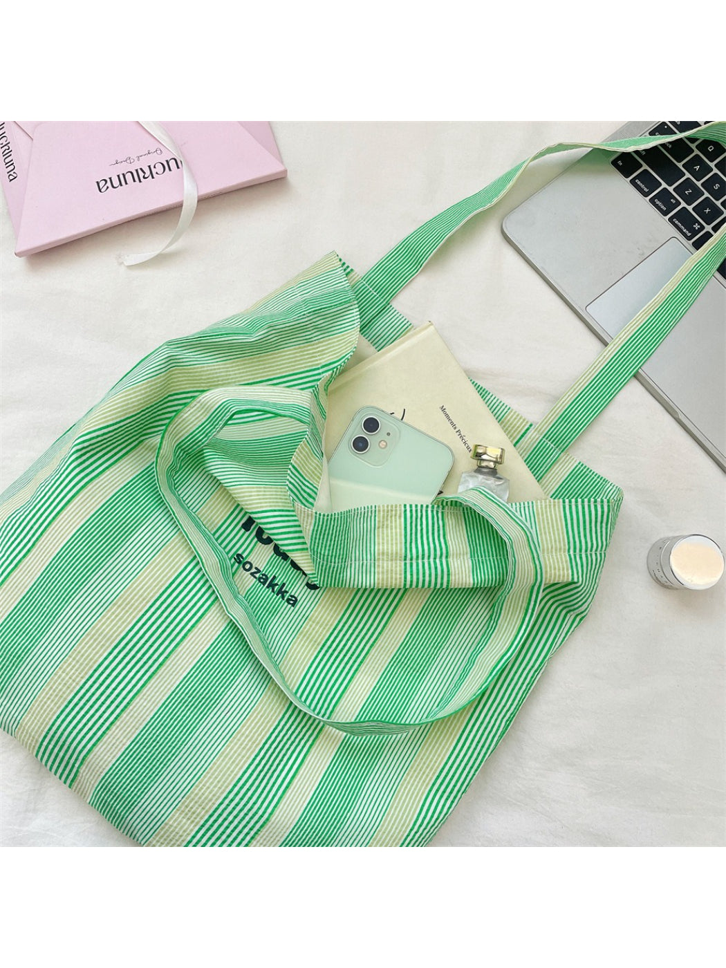 Cosbai casual stripe shopper tote bag styled with casual outfit on a white background