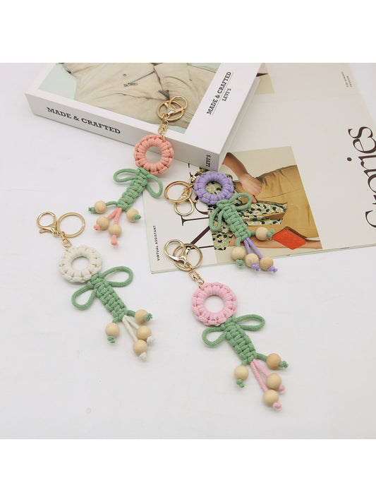 Koco Woven Flower Keychain for Bags showing floral motif and woven texture