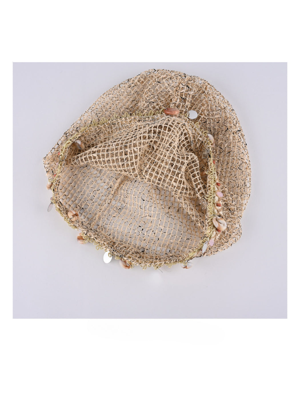 Top view of Haila hollow out knit mesh shell pattern beanie in beige