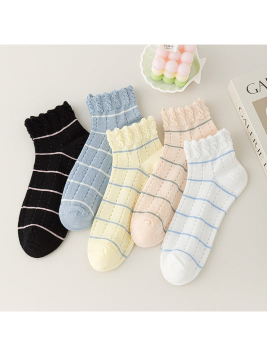 Close-up of Rufia ankle socks showing delicate frill trim and striped pattern