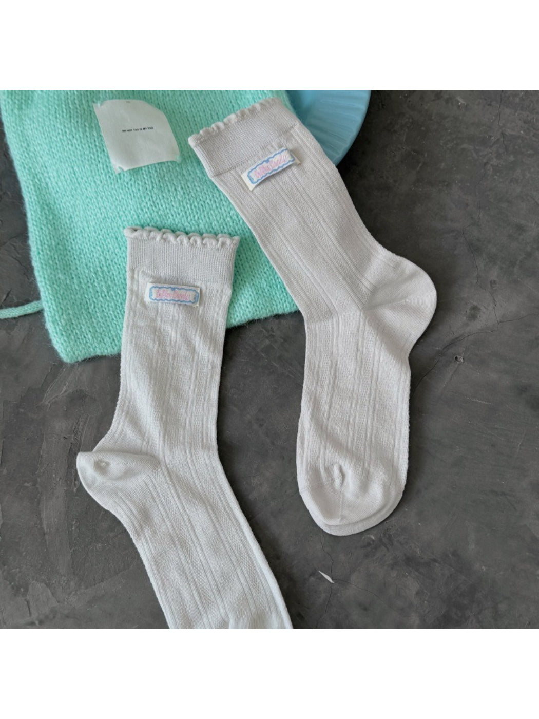 Rufia soft scallop trim socks in multiple colors arranged side by side