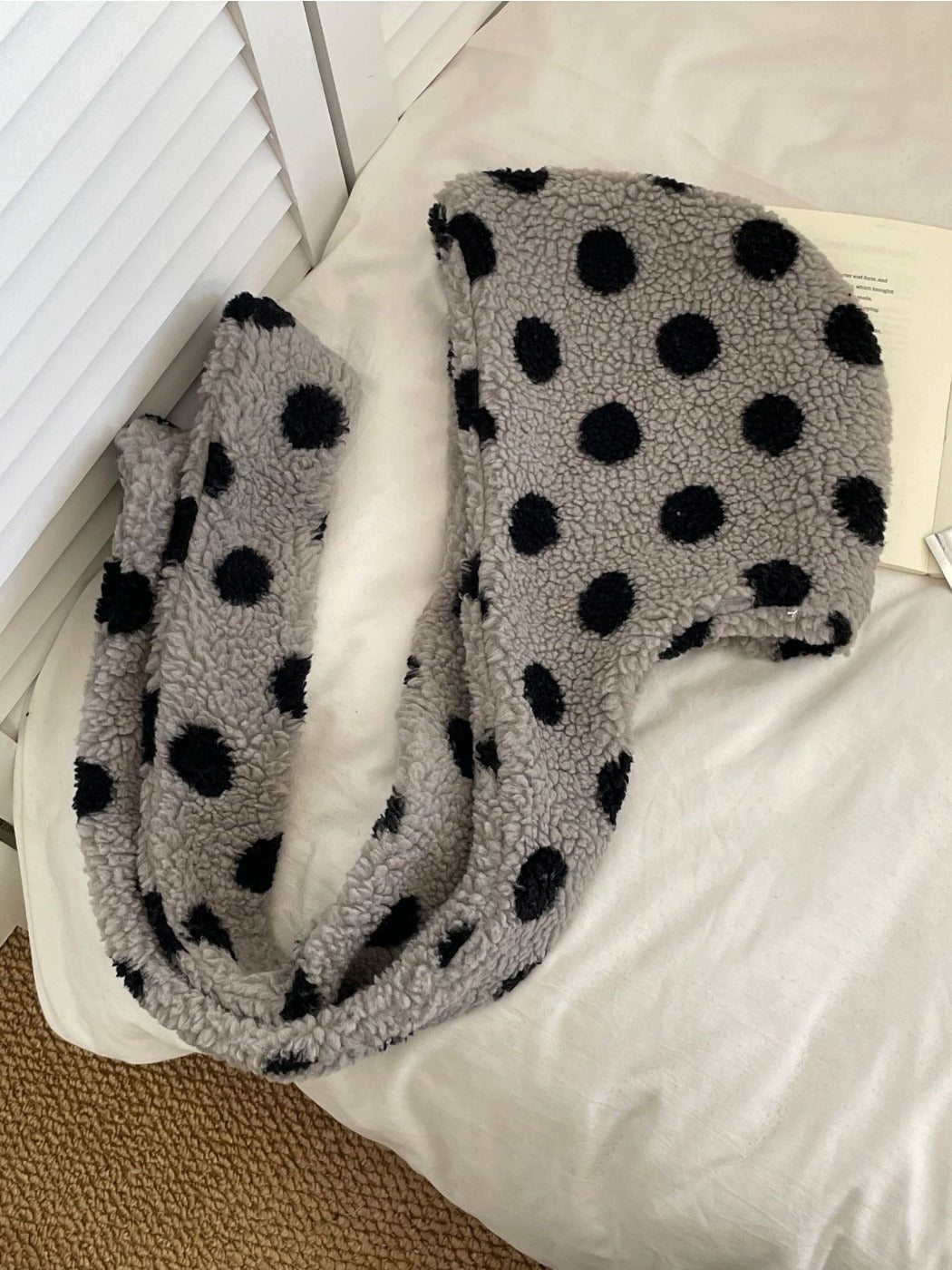 Haila Polka Dot Earflap Hat showing dot pattern