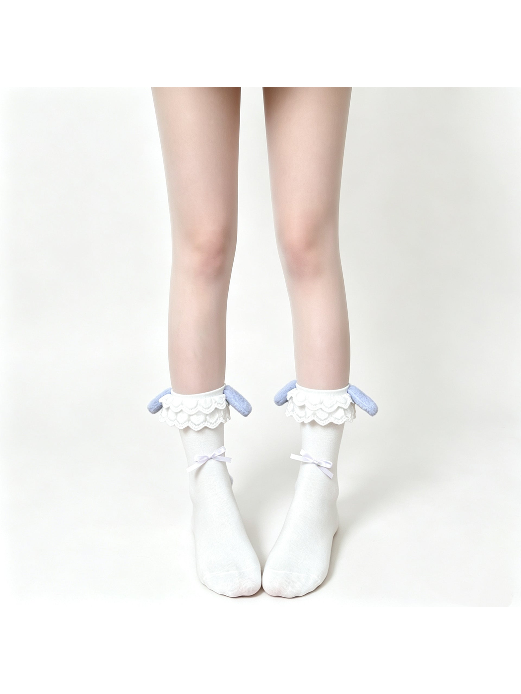White ankle socks with layered lace cuffs, light purple rabbit-ear accents and ribbon bows