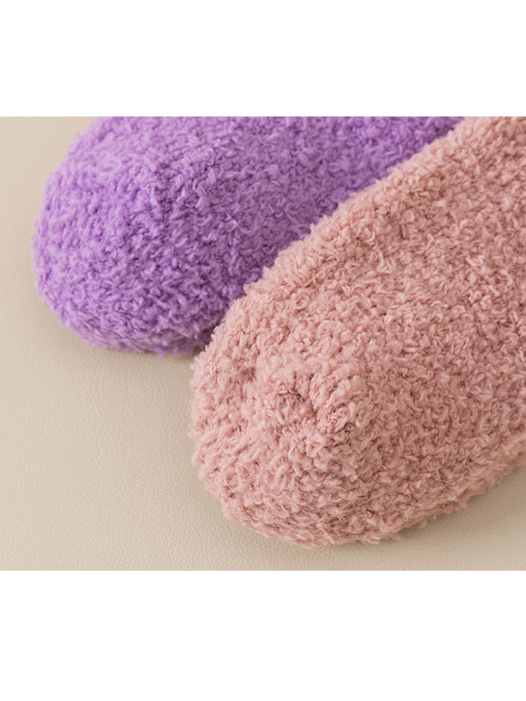 Close-up of the fuzzy looped texture and rounded toe seams