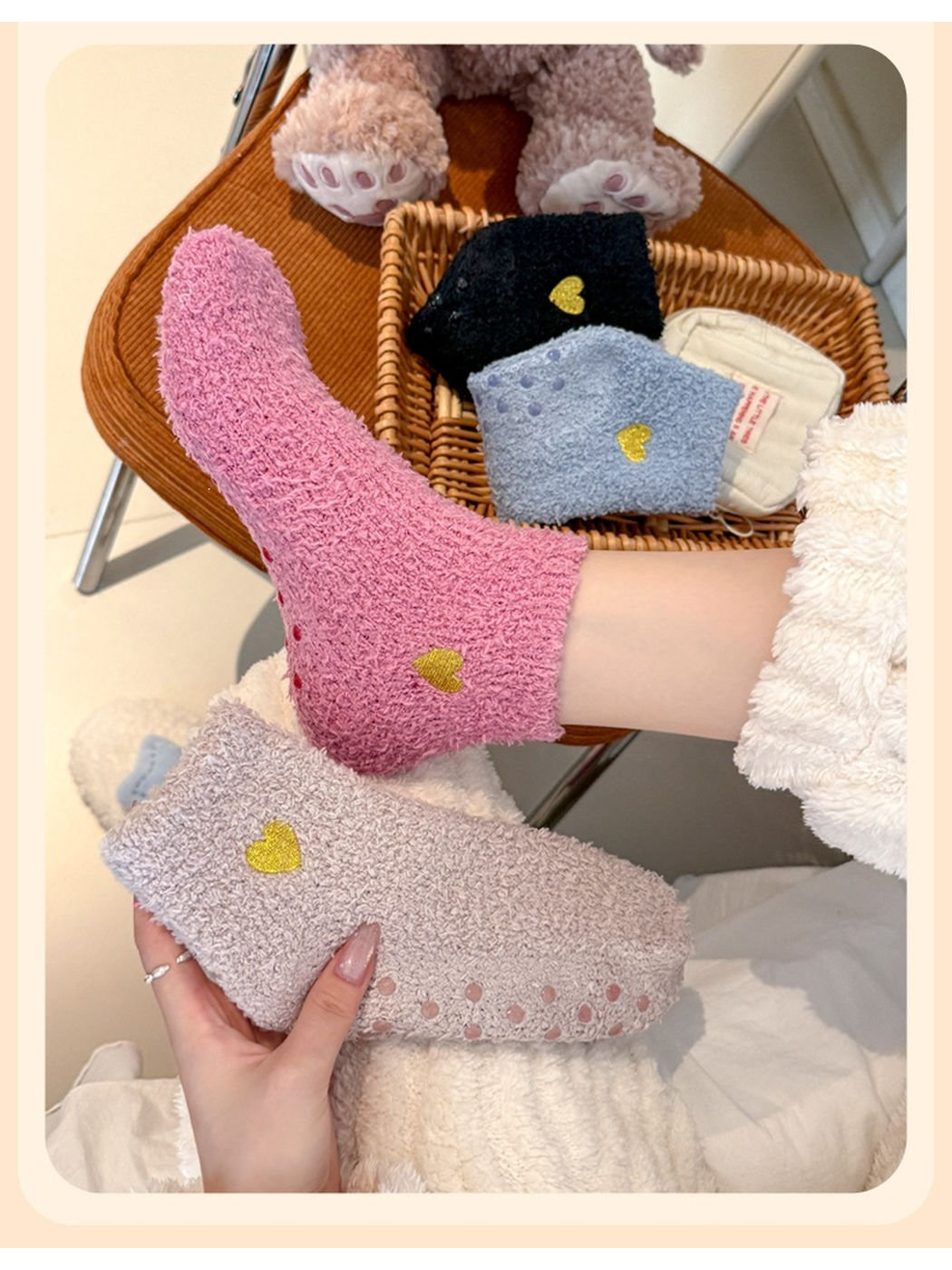 Dusty pink fuzzy ankle sock worn beside a taupe sock showing the raised sole dots