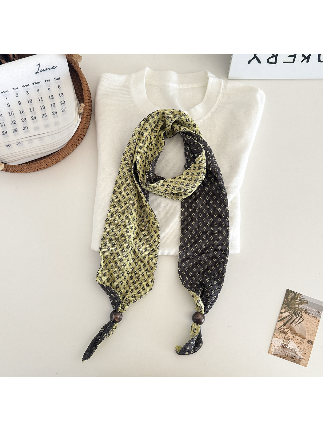 Yellow geometric-patterned narrow scarf with contrasting reverse and bead accents