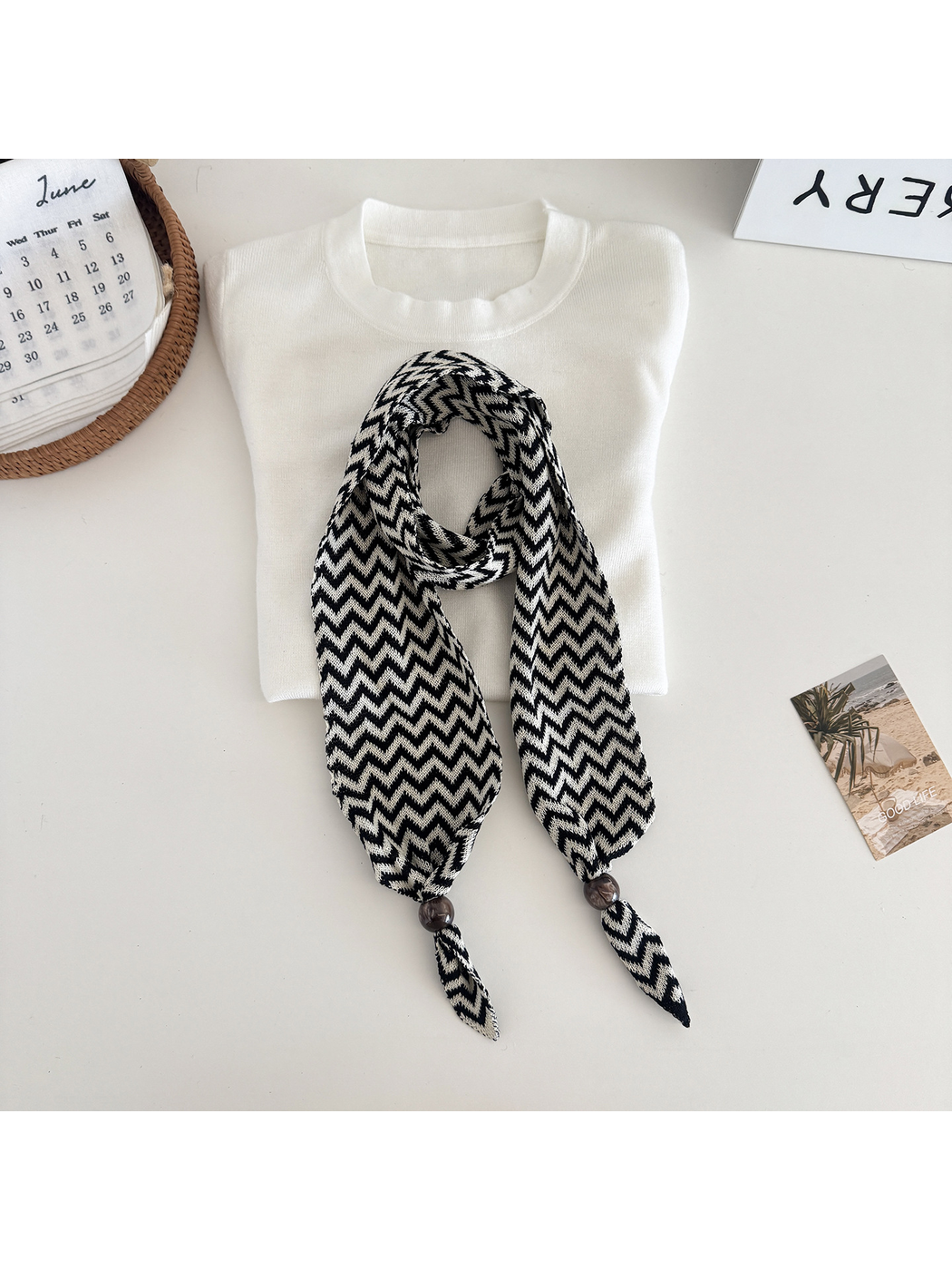 Black / White zigzag scarf with bead-accented pointed ends