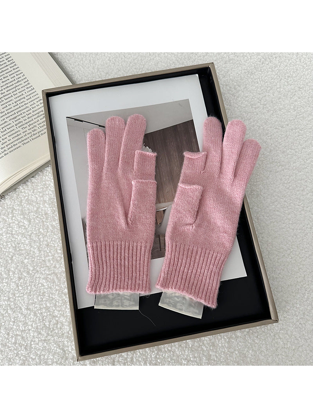 Pink gloves displayed from another angle