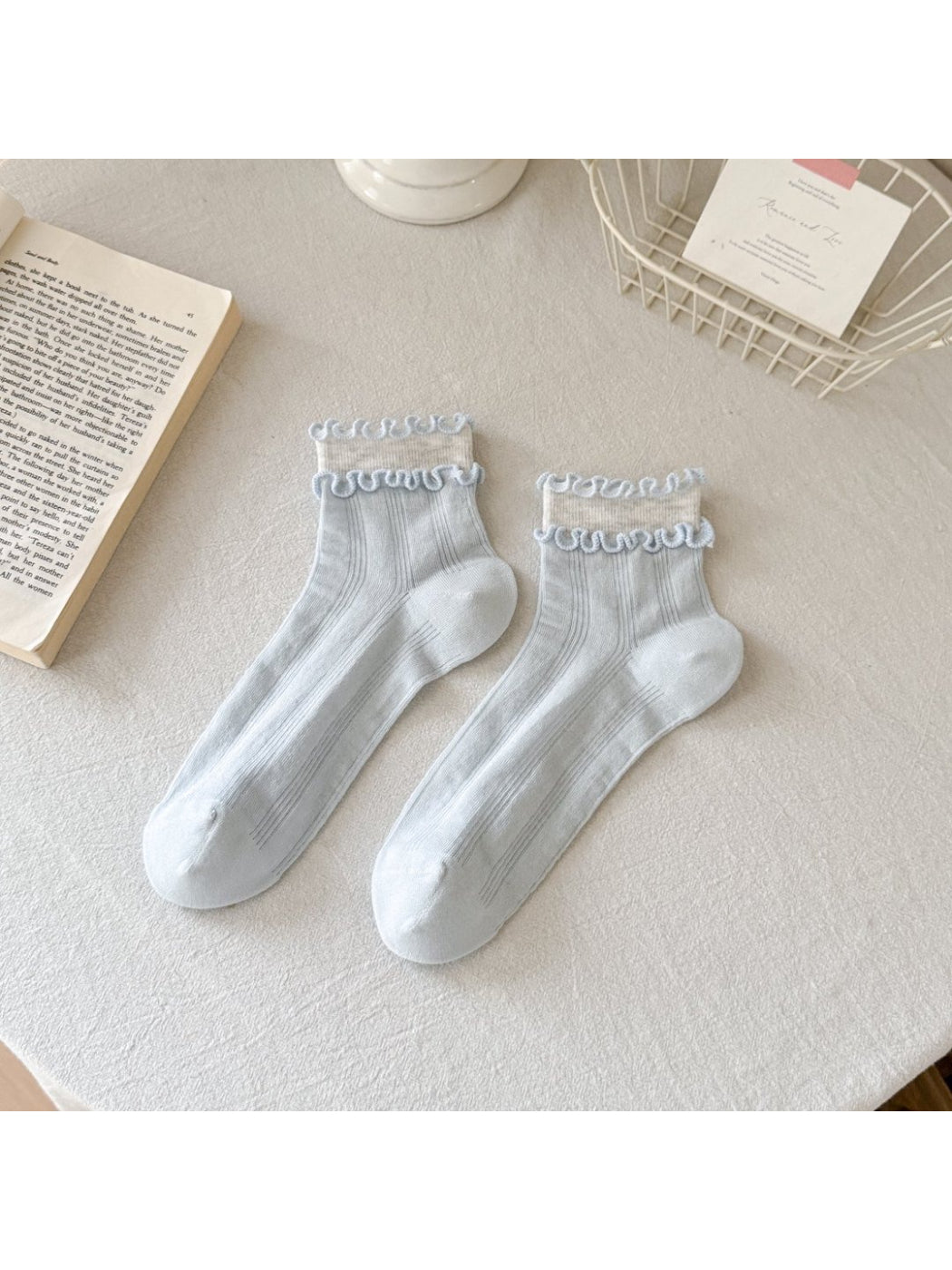 Pair of Rufia Sweet Frill Edge Ribbed Socks in lavender shown with frill edges and ribbing