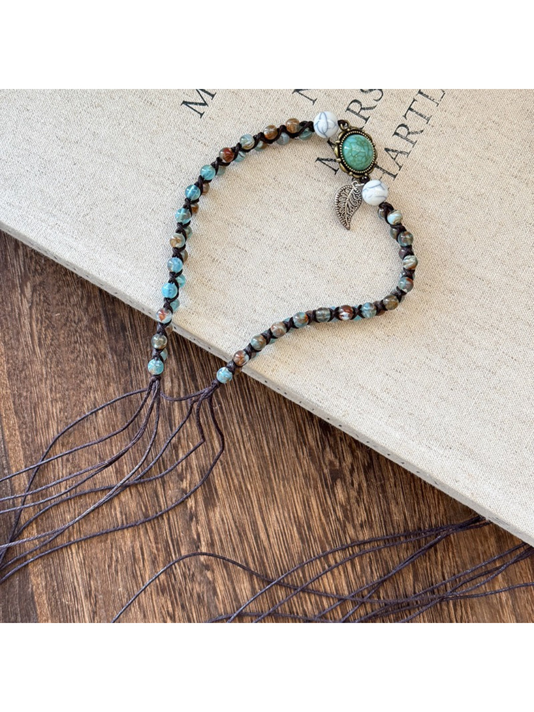 Beco braided boho chain belt coiled to show texture and pattern