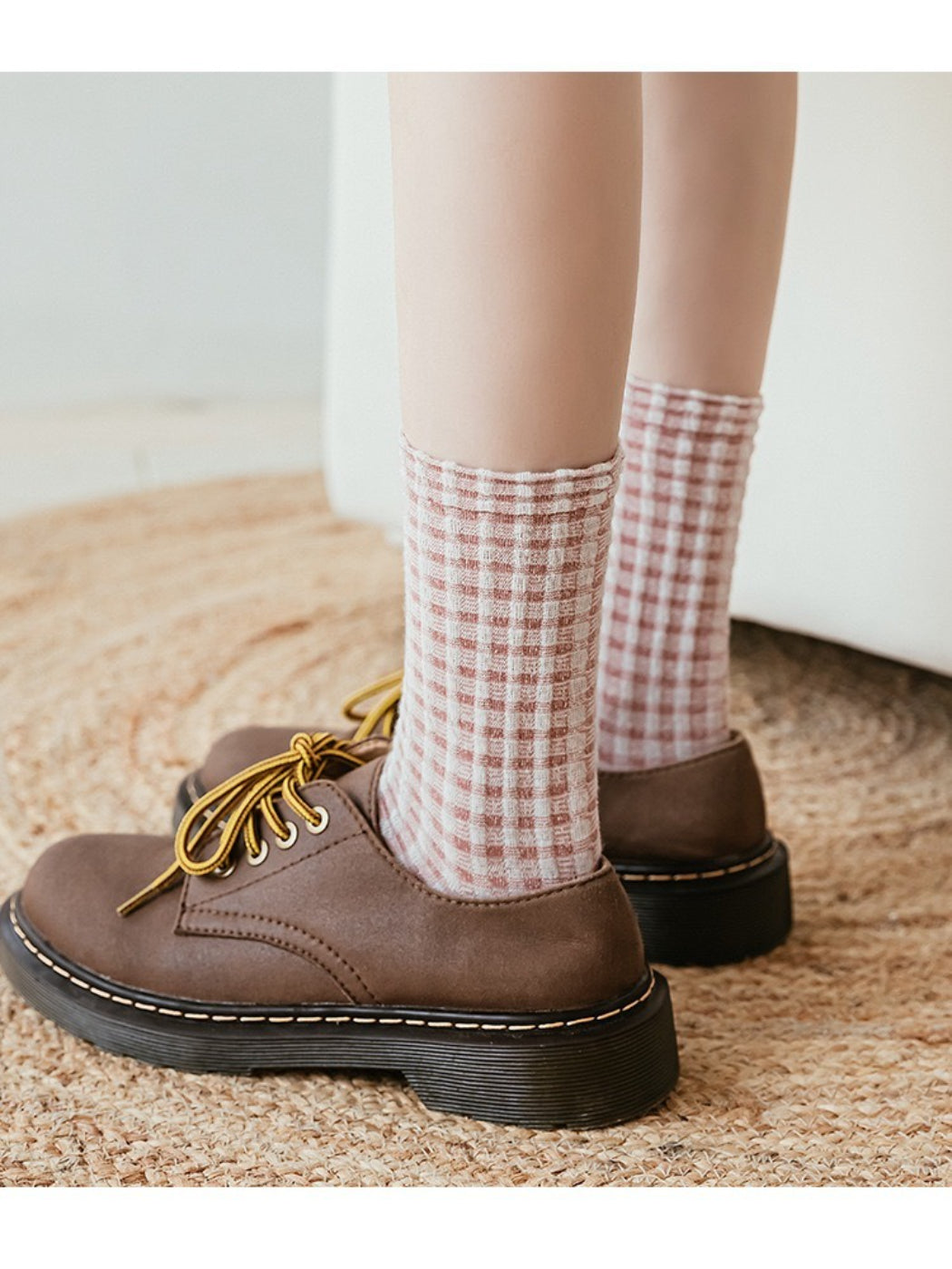 Rufia knit crew socks styled with rolled-up pants and sneakers
