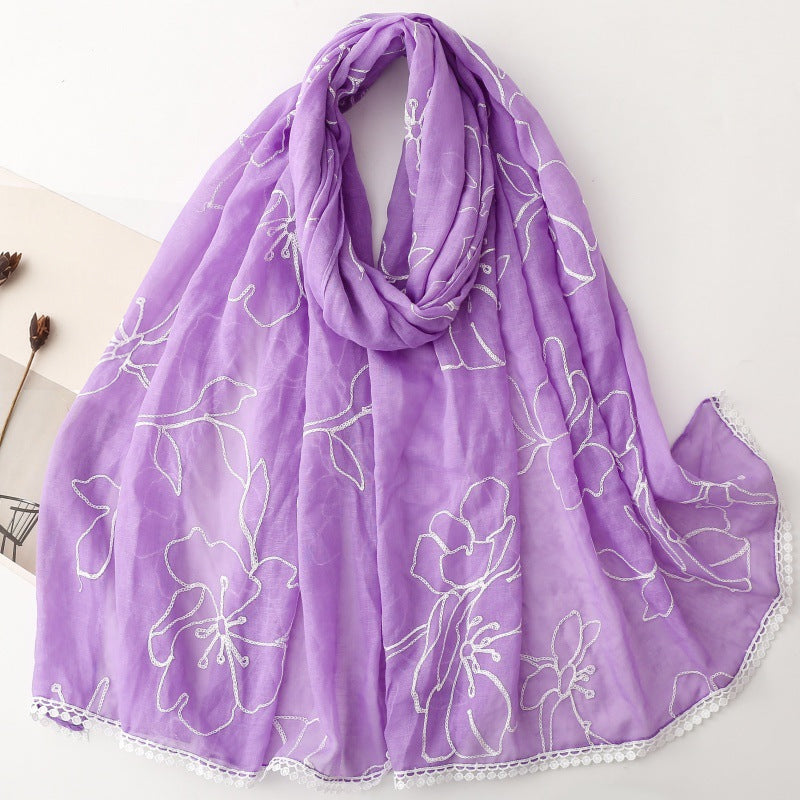 Purple floral embroidered lace trim shawl in a draped product view