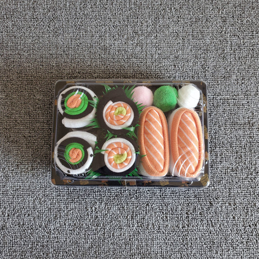 Close-up of sushi pattern on one pair of socks with nigiri design