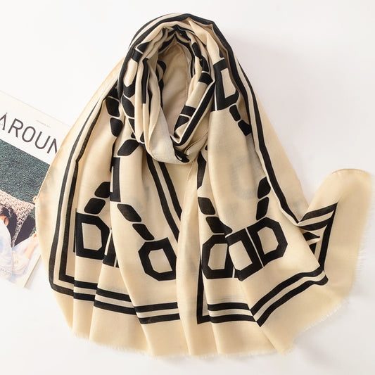 Close-up of Scarvii Letter D long scarf fabric texture and pattern