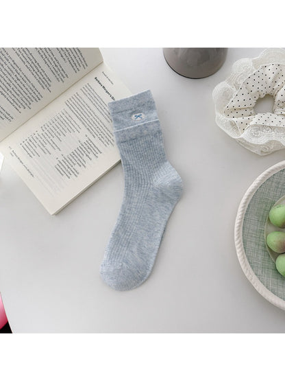 Rufia embroidered mesh mid-calf socks shown from top angle emphasizing mesh fabric